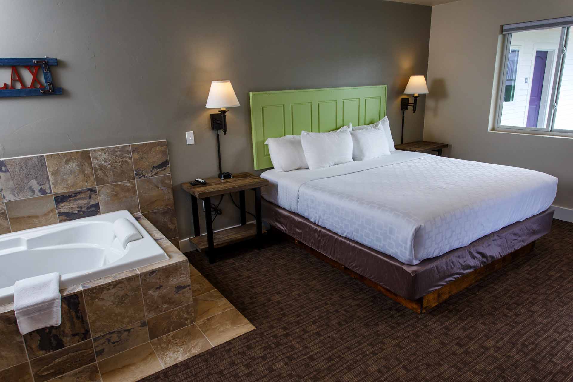 King Whirlpool Room Bed at Julie's Motel in Door County